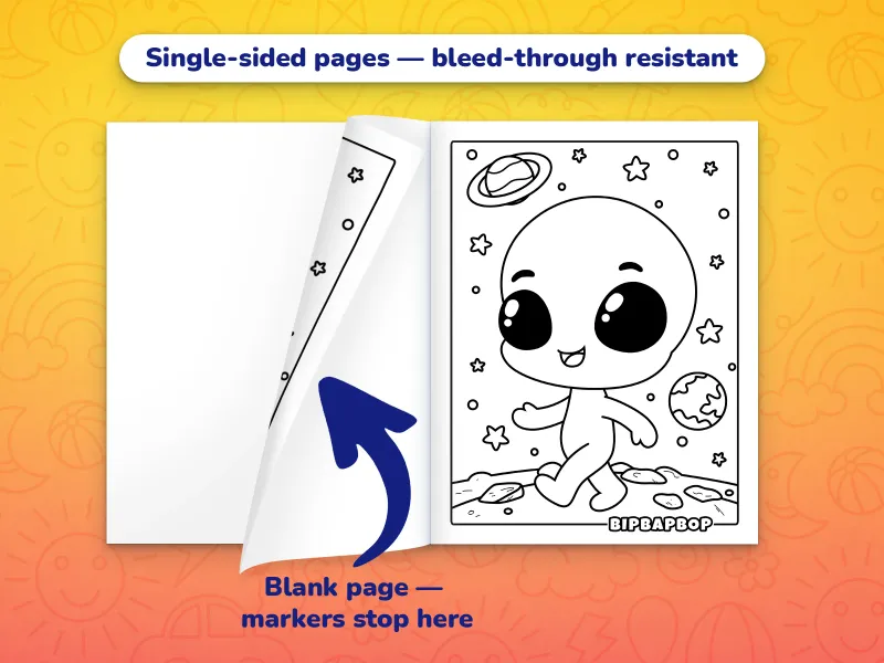 The space coloring book open with an alien walking on a planet to color on the right and a blank page on the left to prevent bleed-through from markers