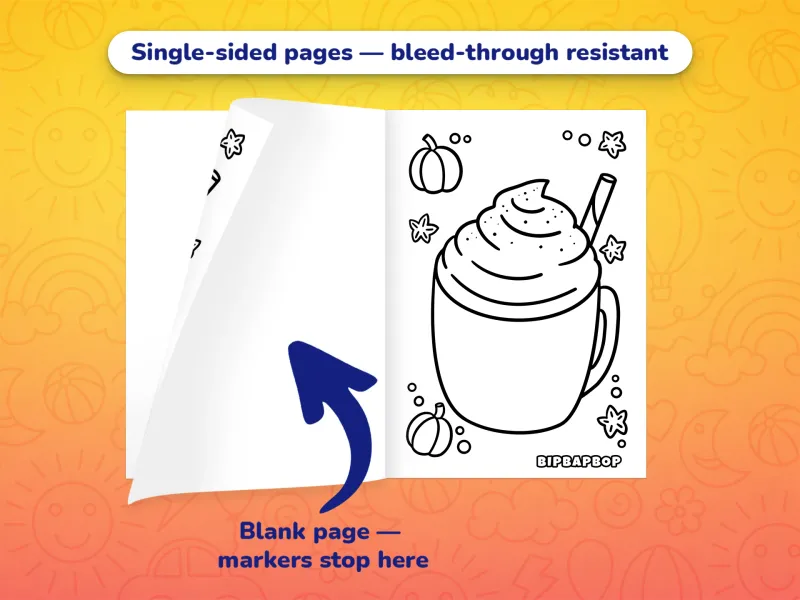 The fall coloring book open with a hot drink to color on the right and a blank page on the left to prevent bleed-through from markers