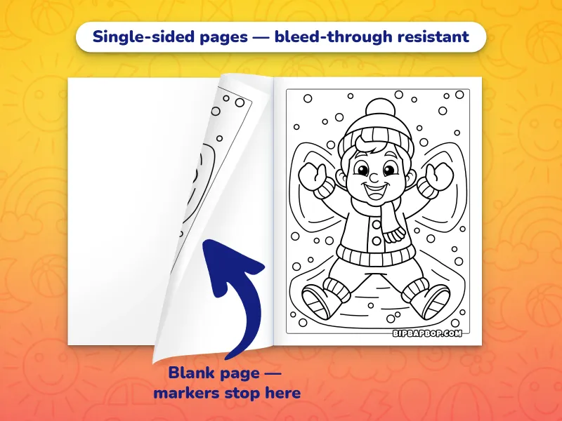 The Christmas coloring book open with a kid making a snow angel to color on the right and a blank page on the left to prevent bleed-through from markers
