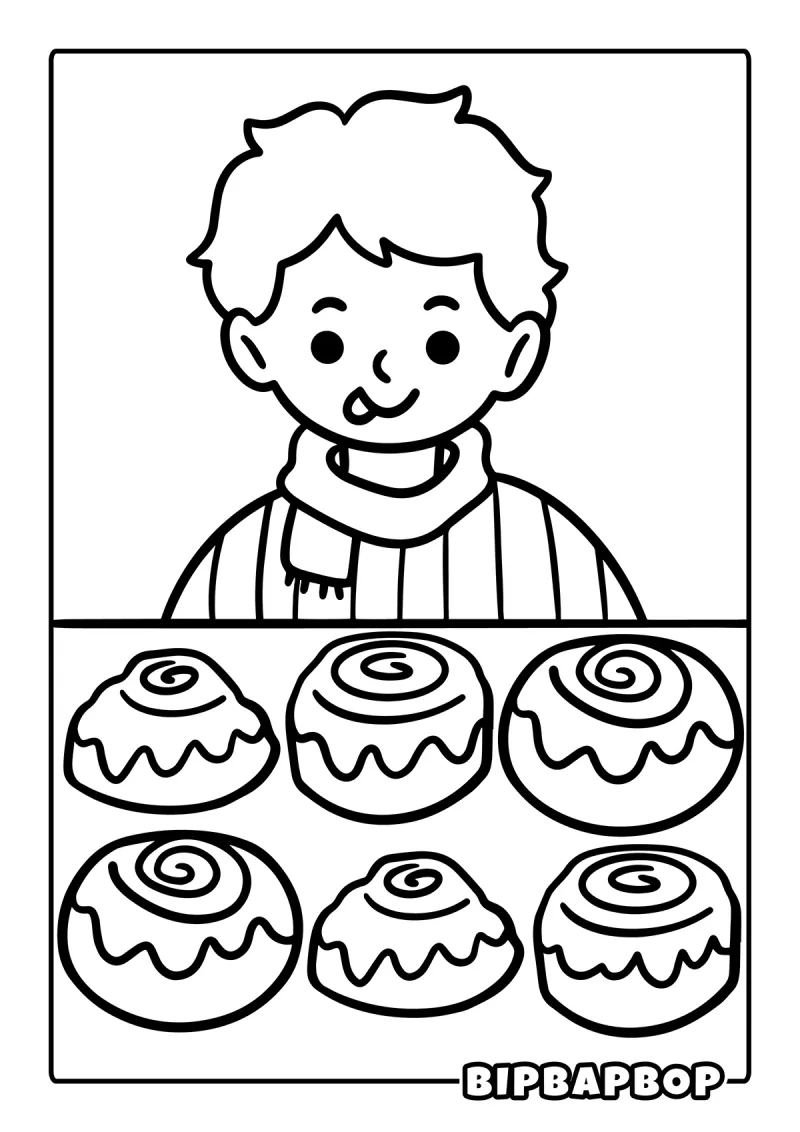 A boy licking his lips at a tray of cinnamon rolls