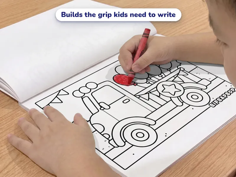 Child with a blue crayon coloring a picture of a truck carrying birthday balloons