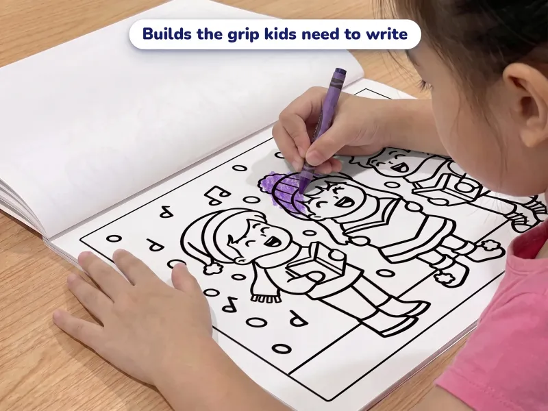 Child with a crayon coloring a picture of three kids carol singing
