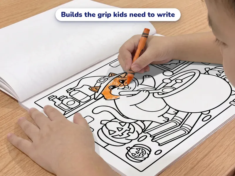 Child with a crayon coloring a wizard cat stirring a potion in his cauldron