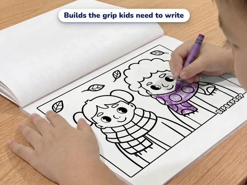 Child with a crayon coloring a picture of two kids wrapped up in scarves