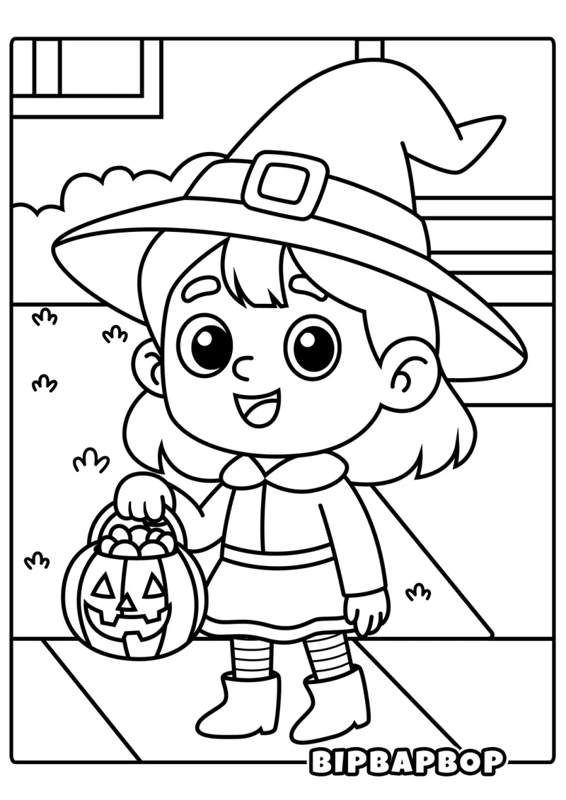 A girl in a witch costume with a pumpkin full of candy