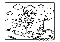 A boy pretending to drive a cardboard box car